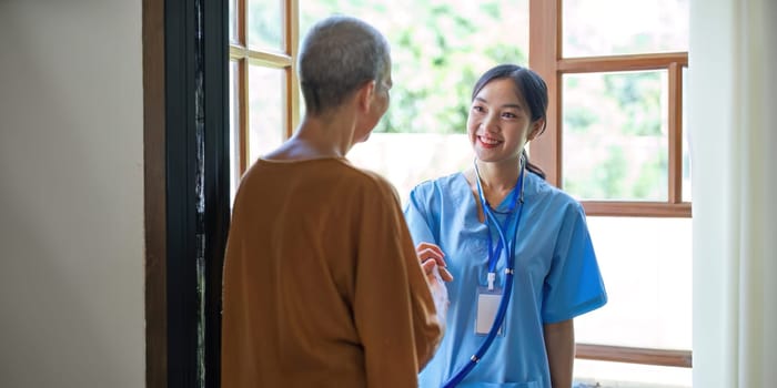 Elderly open door to doctors come for annual home health check-ups based on home health visit services.