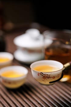 A tranquil scene with tea, elegant teacups, and a charming teapot that captures the essence of relaxation