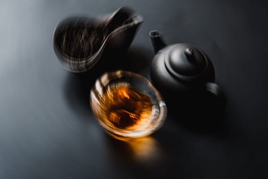 A serene moment featuring brewed tea, an elegant teapot, and fresh leaves, embodying tranquility and calmness