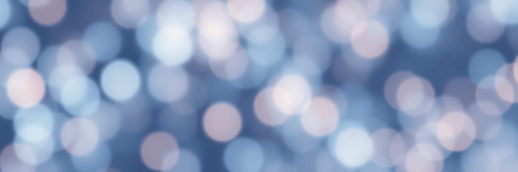 Soft blue bokeh lights shimmer against a blurred background, creating a peaceful and dreamy atmosphere. This serene setting evokes a sense of calm during the evening.