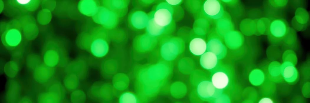 Dazzling green bokeh lights fill the background, creating a lively atmosphere perfect for celebrations, parties, or special events where fun is in the air.