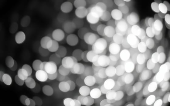 Softly glowing lights fill the background, creating a dreamlike ambiance. The blurred effect enhances the sense of tranquility, evoking feelings of wonder and calm.