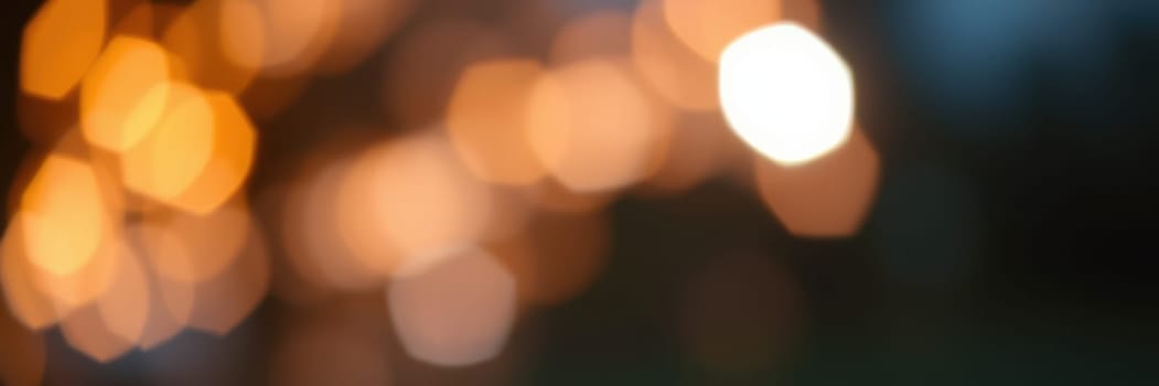 Soft bokeh lights illuminate a garden space, setting a tranquil mood for an evening gathering with friends. Guests can enjoy the warm ambiance and relax in the calm setting.
