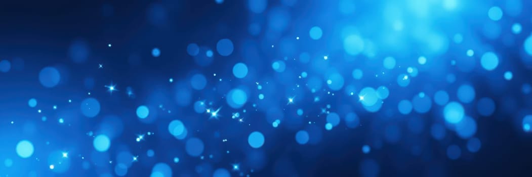 A collection of vibrant blue bokeh lights fills the space, creating a magical ambiance at a nighttime event. Sparkling lights dance softly, enhancing the festive spirit.