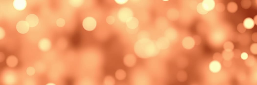 Soft golden bokeh lights illuminate the background during an evening event. Guests enjoy the ambiance, enhancing the festive mood with laughter and conversation.