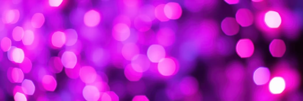 Colorful purple bokeh lights form a dreamy backdrop, adding elegance to a festive evening gathering. The soft glow enhances the celebratory mood and ambiance.