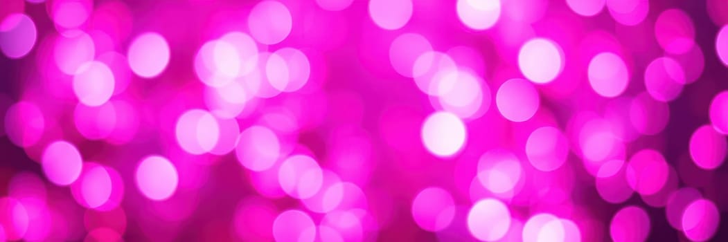 Soft purple bokeh lights create a dreamy ambiance, perfect for enhancing the mood at an evening celebration or social gathering. The glow adds warmth and excitement.