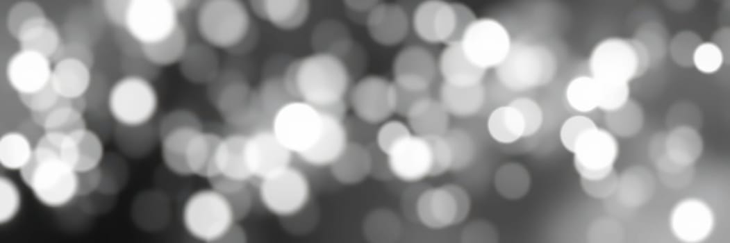 A collection of soft, blurred lights creates a calming atmosphere, enhancing focus and relaxation in a dimly lit environment, ideal for creative pursuits or quiet moments.