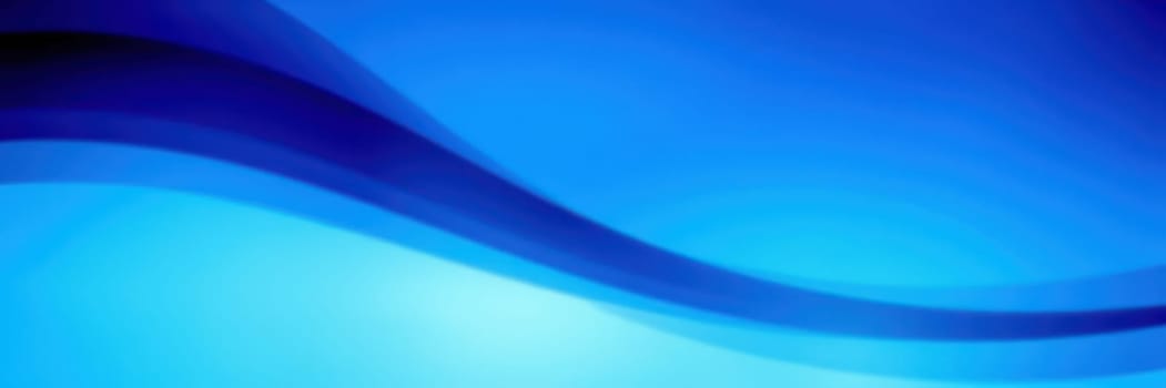 Soft waves of varying blue tones blend seamlessly, creating a calming abstract background that evokes tranquility and peace. Ideal for various design projects or relaxation spaces.