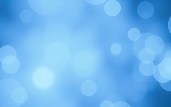A tranquil soft blue backdrop features gentle bokeh lights, ideal for use in digital designs, websites, or creative projects requiring calming imagery.