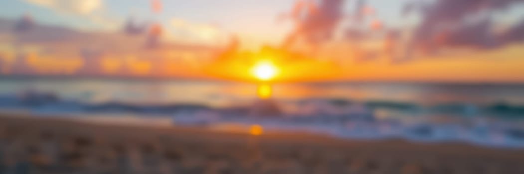 A breathtaking sunset casts warm hues across the sky as the sun descends towards the horizon. Soft waves lap against the sandy shore, creating a serene atmosphere.