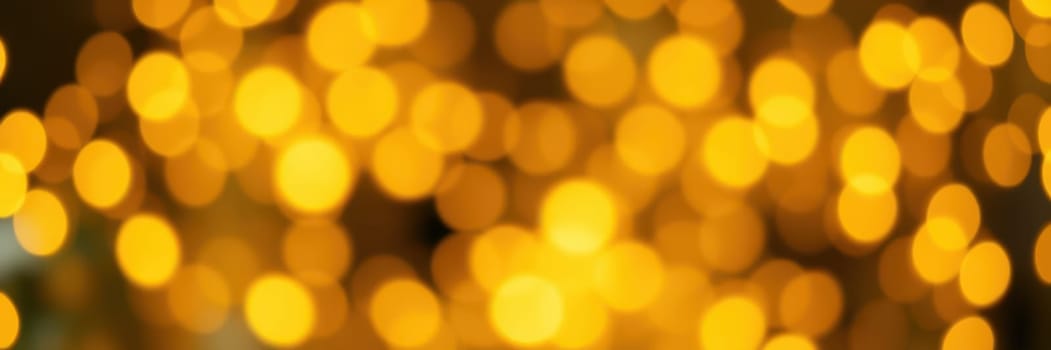 Soft golden bokeh lights illuminate the night sky during a festive gathering, enhancing the joyful ambiance and creating a celebratory mood among attendees in the outdoor area.