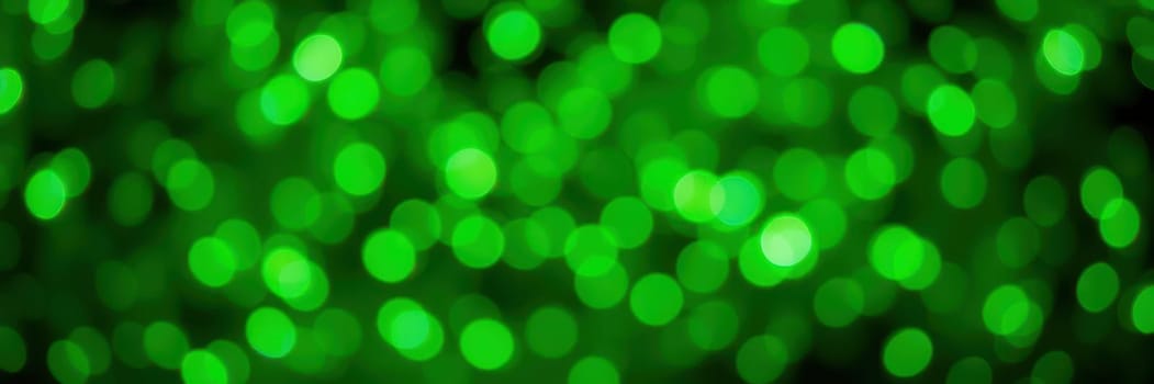 A multitude of bright green bokeh lights fills the background, creating a festive, enchanting atmosphere perfect for celebrations and evening gatherings.