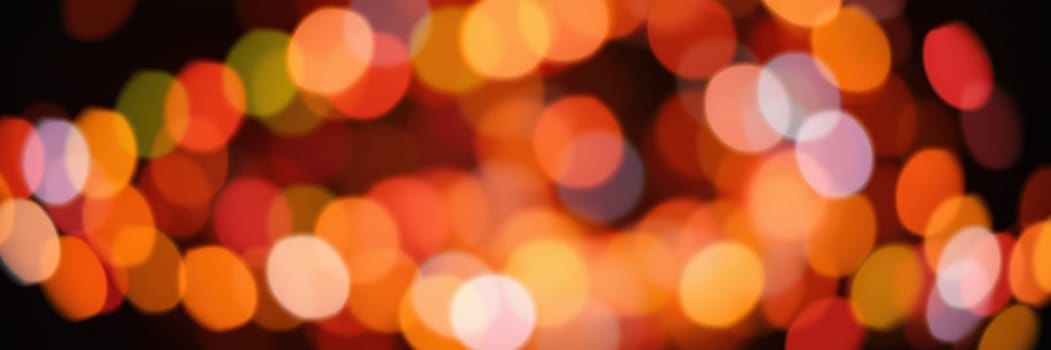 A blurred array of colorful lights fills the background, adding a vibrant and cheerful ambiance to a nighttime celebration, capturing the joy and energy of the moment.