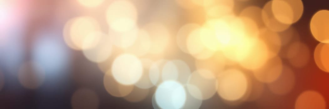 Soft, colorful circles of light create a beautiful bokeh effect, enhancing the ambiance of an evening gathering with warmth and joy. Perfect for festive occasions.