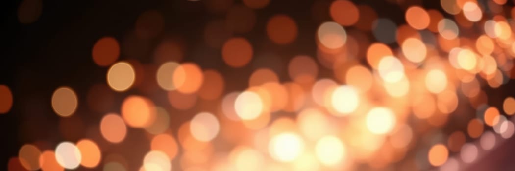 Soft, shimmering bokeh lights illuminate a festive outdoor atmosphere, filling the air with warmth and excitement during an evening gathering, creating a magical experience for all.