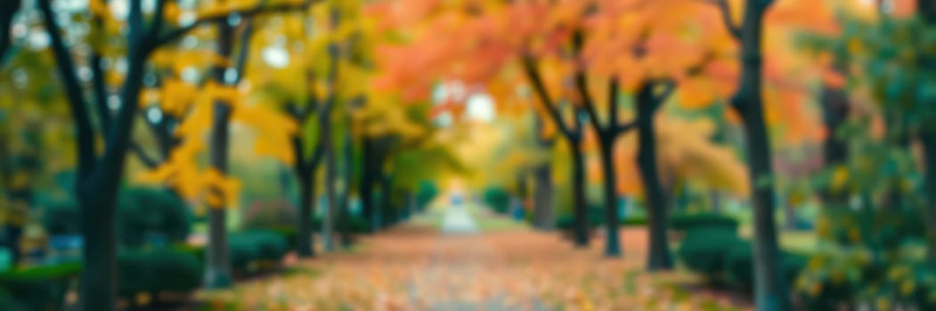 A vibrant pathway in a city park is surrounded by trees showcasing brilliant fall colors. Fallen leaves blanket the ground under bright sunshine, inviting morning strolls.