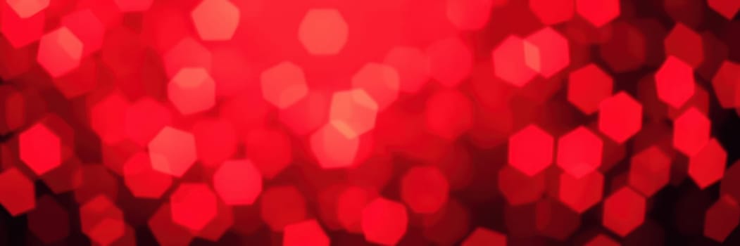 Vibrant red bokeh lights gently blend together, creating a warm and inviting backdrop perfect for events or creative projects. The hues enhance the sense of celebration and joy.