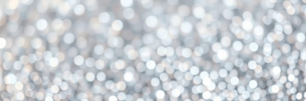 A shimmering background filled with soft silver bokeh creates an elegant and festive mood, perfect for holiday gatherings and celebrations of joy.