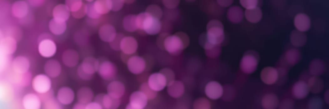 A collection of soft, blurred purple bokeh lights fills the background, adding a whimsical and dreamy vibe to the ambiance of an evening event focused on art and creativity.