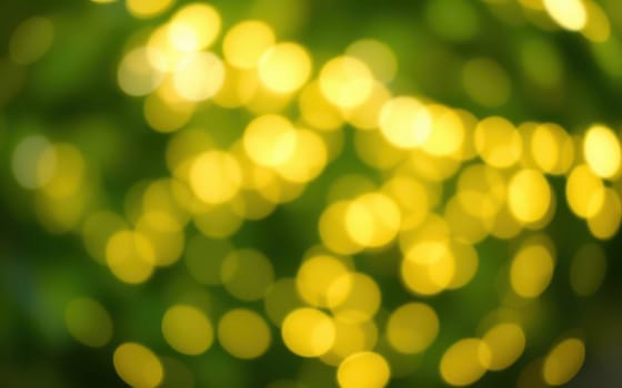Soft golden bokeh lights glimmer amidst green foliage, creating a dreamy and enchanting backdrop in a tranquil garden at dusk.