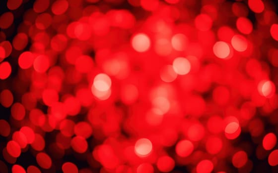 Soft red bokeh lights fill the background, creating a festive and warm ambiance perfect for celebrations. The lights twinkle softly, enhancing the joyful mood of the environment.