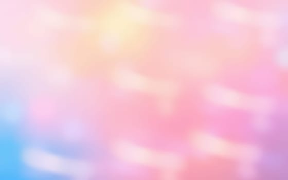 Gentle pastel shades of pink, blue, and peach swirl together in a calm sky, reminiscent of a tranquil sunset, evoking feelings of peace and serenity.