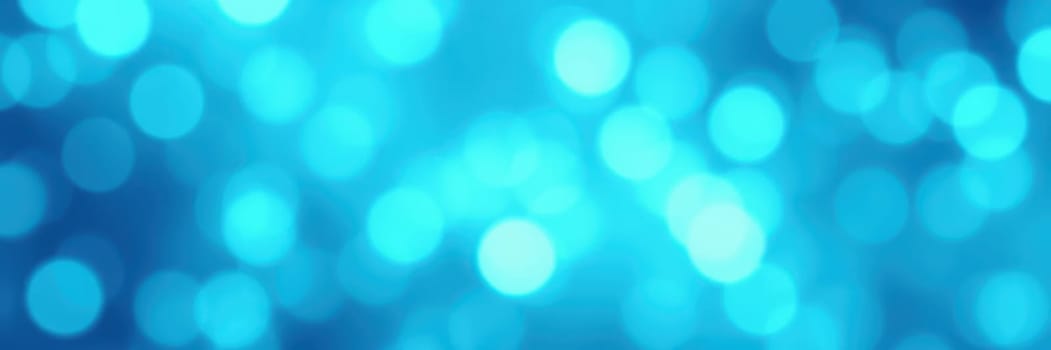 Soft blue lights form a beautiful bokeh effect, creating a serene and calming atmosphere ideal for relaxation or boosting creativity and inspiration, suitable for various settings.
