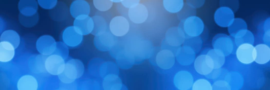 A cascade of soft blue bokeh lights fills the background, offering a dreamy and vibrant aesthetic perfect for artistic and digital creations. The lights create an enchanting atmosphere.