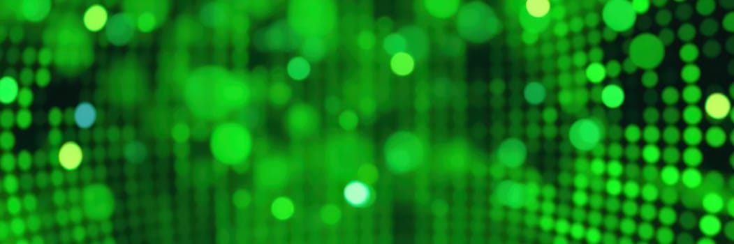 Vibrant green bokeh lights create a lively background, showcasing a mesmerizing display of blurred circles. This design element enhances visual interest in creative projects.