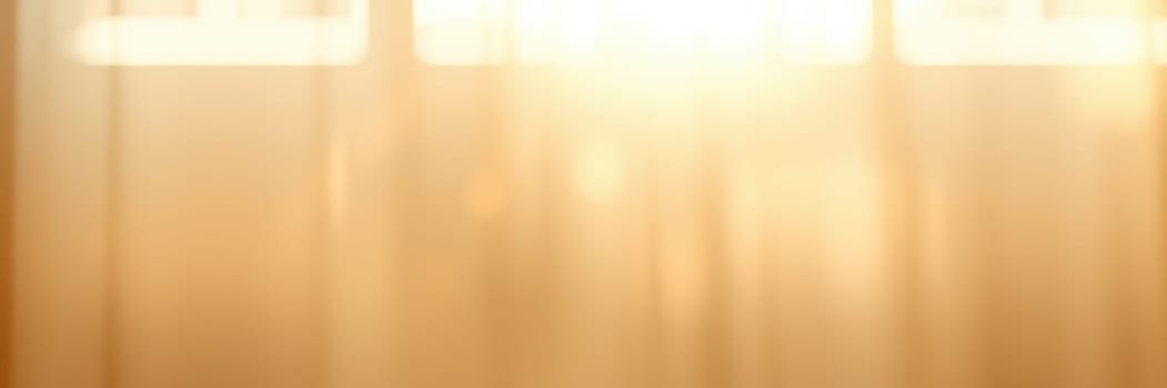 Sunlight streams through large windows, casting a warm glow in a calm indoor space. The soft light enhances the peaceful atmosphere, inviting relaxation and contemplation.