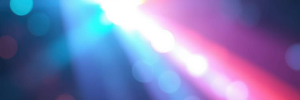 Bright beams of colored light illuminate a lively urban event at night, creating an energetic and festive atmosphere. People enjoy the music and excitement around them.