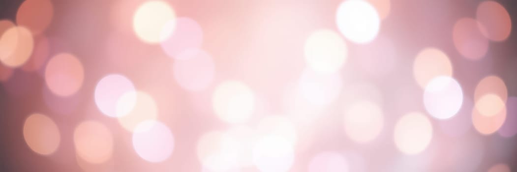 Blurred lights in soft shades form a warm, inviting ambiance, perfect for evening gatherings and celebrations. The atmosphere feels magical and festive.