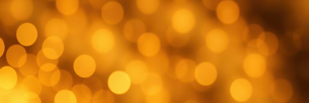 A series of bright golden bokeh lights illuminate the background, creating a festive and warm atmosphere ideal for celebrations, events, or cozy gatherings during the evening.