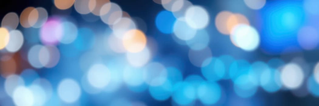 Bright, colorful bokeh lights create a vibrant atmosphere in a bustling city at night. The blurred lights reflect the energy and excitement of urban nightlife.