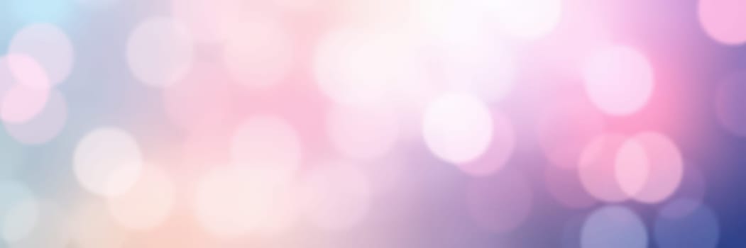 Soft, blurred lights in various hues create a colorful bokeh background. This dreamy effect evokes a sense of calm and wonder, perfect for creative projects.