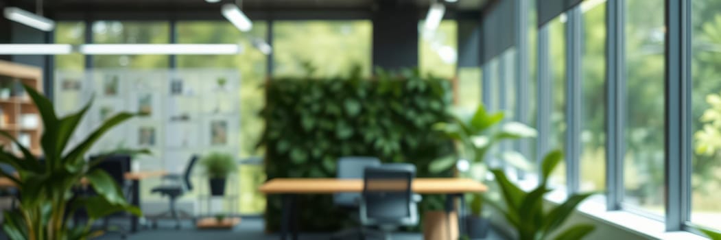 Bright and open office environment with large windows allowing natural light. Potted plants add a touch of greenery, creating a fresh atmosphere for work.