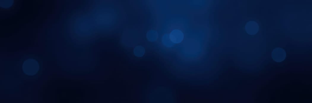 A group of divers explores an underwater world, surrounded by dynamic patterns of light reflecting off bubbles in a serene blue environment.