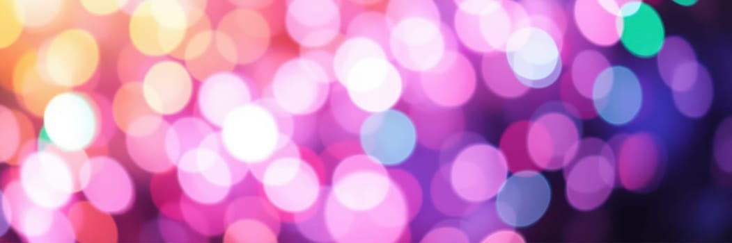 A dazzling array of colorful bokeh lights illuminates the surroundings, enhancing the festive ambiance of a city celebration during the evening hours.