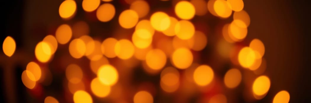 Soft orange lights illuminate a festive setting, enhancing the ambiance for celebrations. This warm illumination brings a sense of joy and togetherness.