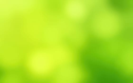 A vibrant blur of green shades fills the space, enhanced by soft light filtering through foliage, evoking a peaceful and serene nature setting during daylight.