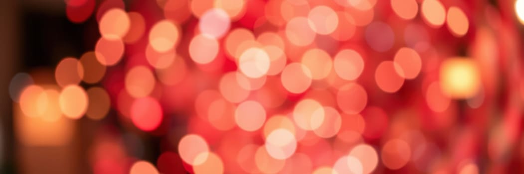 Soft, out-of-focus lights create a warm, inviting glow in a dimly lit space, suggesting a celebration or gathering during a cozy evening atmosphere.