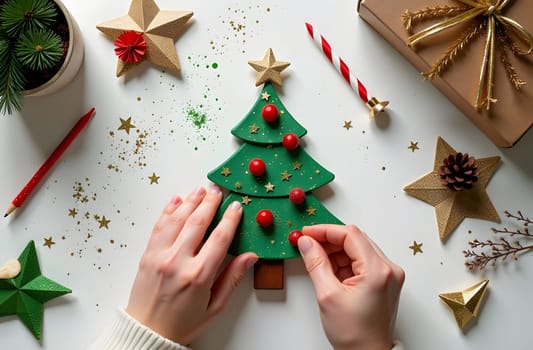 Hands crafting homemade Christmas ornaments using simple materials, with a festive and creative atmosphere filled with holiday spirit. High quality photo