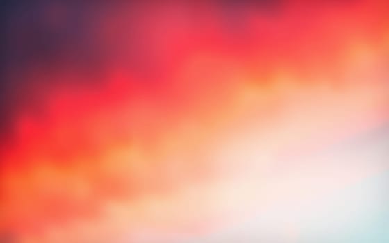 Bright colors fill the sky during sunset, blending hues of orange, red, and white. The scene creates a peaceful atmosphere perfect for relaxation.