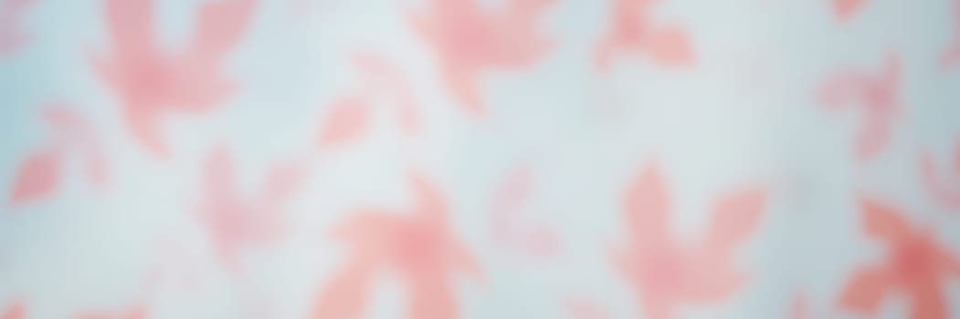 Soft pink floral shapes blend seamlessly into a light background, creating an inviting and tranquil ambiance that enhances any modern interior decor.