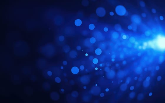 Vibrant blue particles float against a dark background, creating a mesmerizing visual effect. The lights appear to radiate from a central point, adding depth and movement.