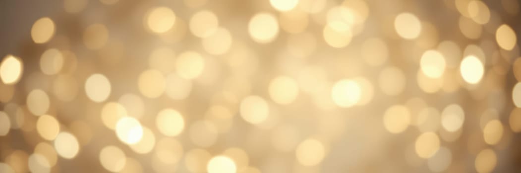 A mesmerizing display of soft golden bokeh lights illuminates the space, enhancing the festive mood during a celebration held at night.