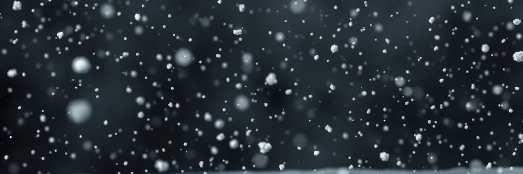 Soft snowflakes cascade down against a dark background, creating a tranquil winter setting. The peaceful scene captures the beauty of snowfall.