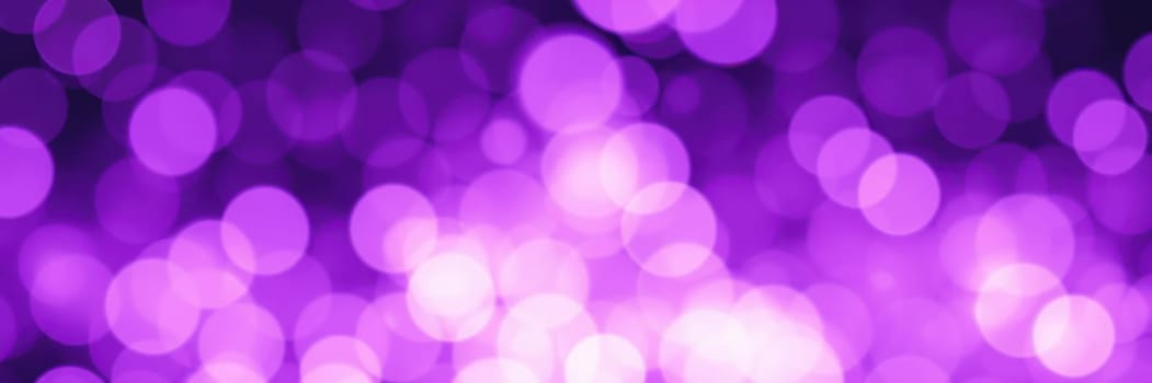 Vibrant purple bokeh lights fill the background, creating a dreamy and festive atmosphere ideal for celebrations, parties, and special occasions during nighttime events.