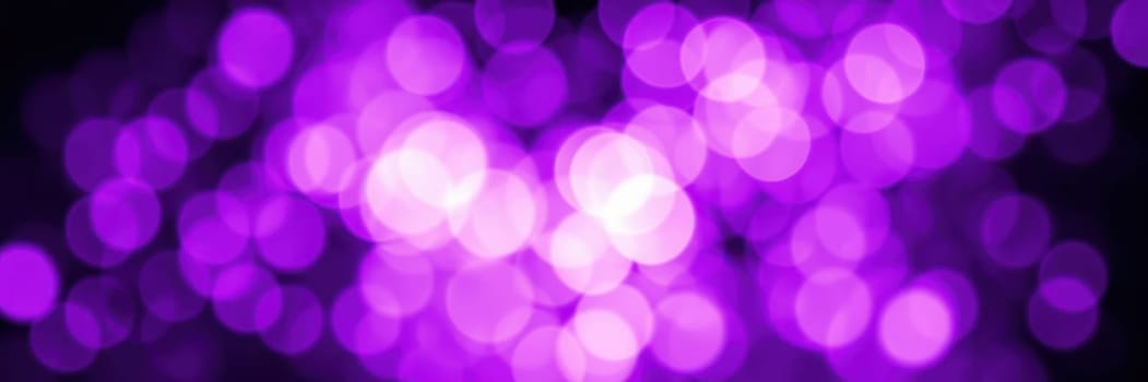 A collection of soft purple bokeh lights fills the background, creating a festive and enchanting ambiance ideal for events, parties, or celebrations.